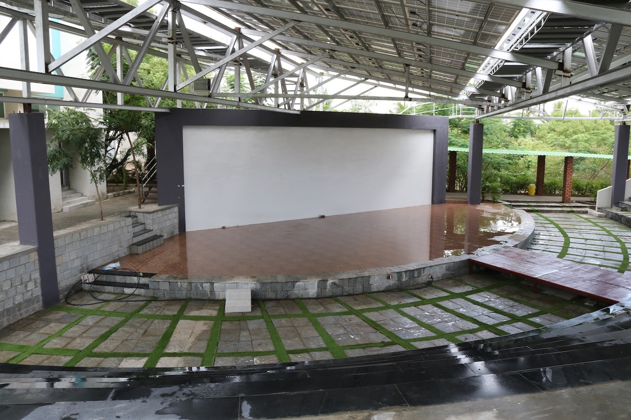 Open-air amphitheatre with solar roof and stage