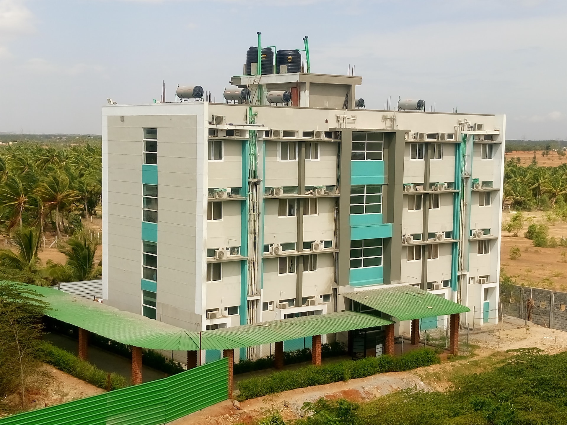 College building — multi-storey with teal accents