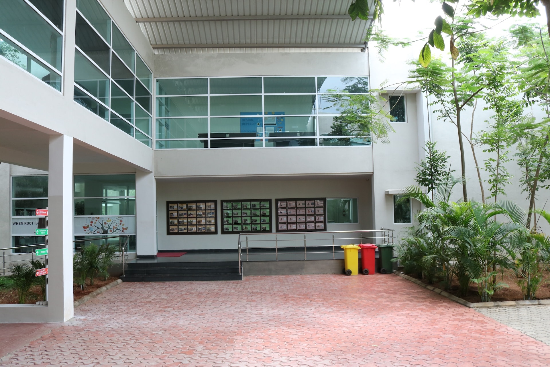 School campus — modern glass and concrete facade
